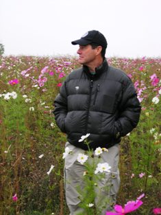 Mike in flowers.jpg